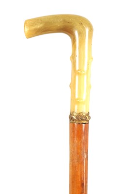 Lot 473 - A LATE 19TH CENTURY RHINOCEROS HORN HANDLED SWORD STICK