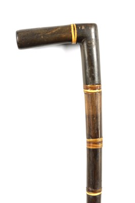 Lot 447 - A 19TH CENTURY SEGMENTED RHINOCEROS HORN WALKING STICK