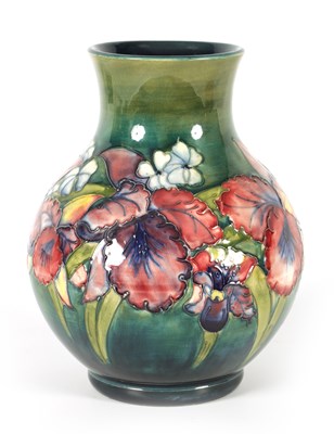 Lot 99 - A 20TH CENTURY MOORCROFT ORCHIDS PATTERN BULBOUS VASE