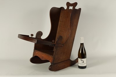 Lot 1116 - AN 18TH CENTURY OAK CHILD'S ROCKING CHAIR