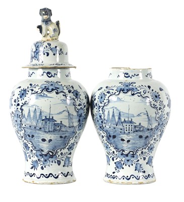 Lot 36 - A PAIR OF 18TH CENTURY BLUE AND WHITE DELFT VASES AND COVER