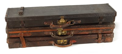 Lot 372 - A COLLECTION OF THREE LEATHER AND CANVAS LINED SHOTGUN CASES