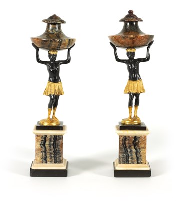 Lot 674 - A PAIR OF 19TH CENTURY REGENCY STYLE BLUE JOHN GILT AND COLD PAINTED BRONZE FIGURAL URNS