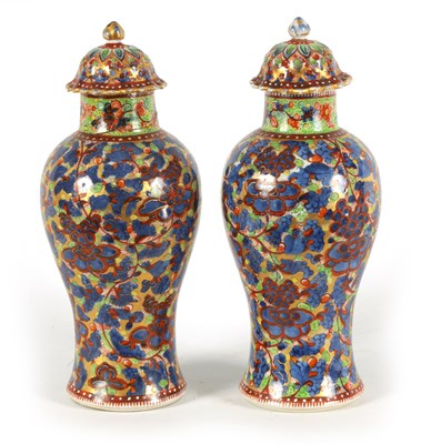 Lot 138 - A PAIR OF CHINESE KANGXI PERIOD INVERTED BALUSTER VASES AND COVERS