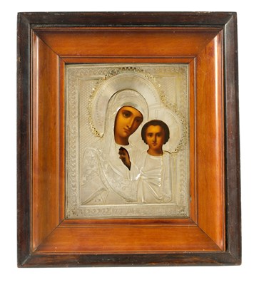 Lot 785 - A 19TH CENTURY RUSSIAN SILVER ICON OF THE VIRGIN MARY AND CHILD