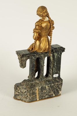 Lot 731 - A LATE 19TH CENTURY ART NOUVEAU GILT BRONZE AND IVORY FIGURE OF A SEATED YOUNG LADY