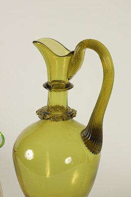Lot 19 - A LATE 19TH CENTURY WHITEFRIARS STYLE GREEN GLASS EWER