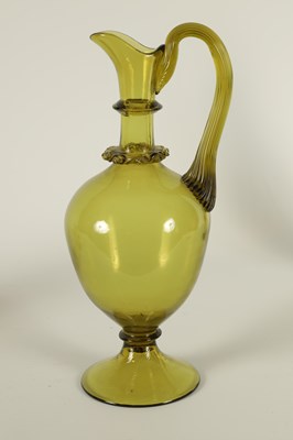 Lot 19 - A LATE 19TH CENTURY WHITEFRIARS STYLE GREEN GLASS EWER