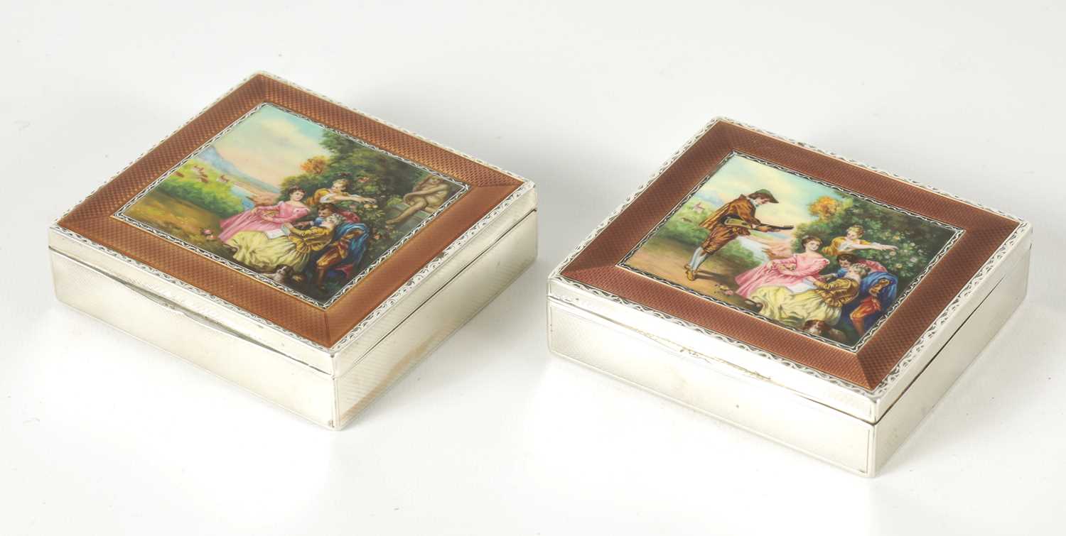 Lot 291 - A PAIR EARLY 20TH CENTURY CONTINENTAL SILVER AND ENAMEL TABLE CIGARETTE BOXES
