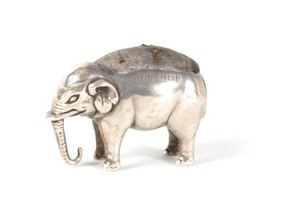 Lot 341 - AN EDWARD VII SMALL SILVER PIN CUSHION IN THE FORM OF AN ELEPHANT