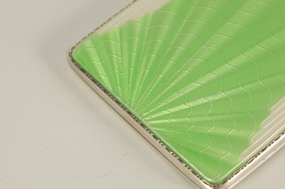 Lot 186 - AN ART DECO SILVER AND GUILLOCHE ENAMEL CIGARETTE CASE