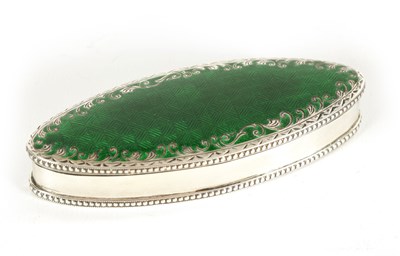 Lot 259 - AN EDWARD VII SILVER AND CHEQUERBOARD PATTERN GUILLOCHE ENAMEL ECLIPSE SHAPED BOX