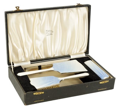 Lot 312 - A FINE AND UNUSUAL GEORGE VI 4 PIECE SILVER AND GUILLOCHE ENAMEL DRESSING TABLE SET