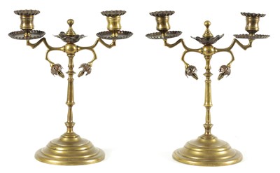 Lot 521 - ATTRIBUTED TO WILLIAM ARTHER SMITH BENSON, A STYLISH PAIR OF ARTS AND CRAFTS PATINATED COPPER AND BRASS TWO BRANCH CANDLEARBRA