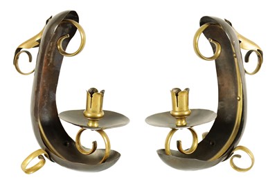 Lot 537 - ATTRIBUTED TO WILLIAM ARTHUR SMITH BENSON A STYLISH PAIR OF ARTS AND CRAFTS PATINATED COPPER AND BRASS CHAMBER CANDLESTICKS