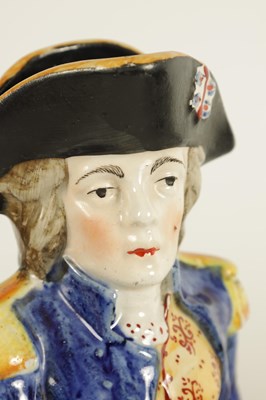 Lot 71 - A 19TH CENTURY POLYCHROME FIGURAL TOBY JUG DEPICTING ADMIRAL LORD NELSON