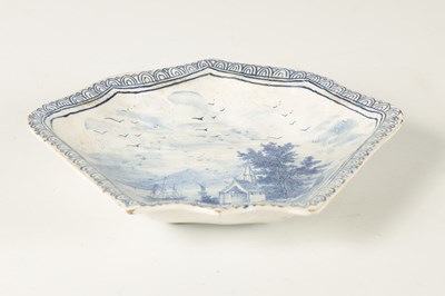Lot 81 - AN 18TH/19TH CENTURY DELFT BLUE AND WHITE SHAPED SHALLOW DISH