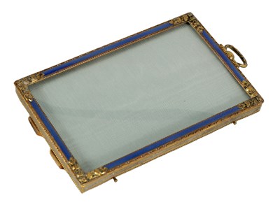 Lot 279 - A 19TH CENTURY FRENCH GILT BRASS AND BLUE GUILLOCHE ENAMEL PICTURE FRAME OF SMALL SIZE