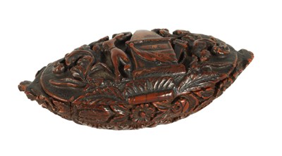 Lot 590 - A 19TH CENTURY CARVED CAQUILLA NUT SNUFF BOX