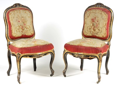 Lot 1125 - A PAIR OF 19TH CENTURY FRENCH EBONISED AND GILT SALON CHAIRS