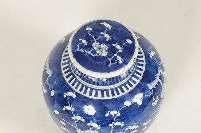 Lot 187 - A 19TH CENTURY CHINESE BLUE AND WHITE PRUNUS BLOSSOM GINGER JAR AND COVER