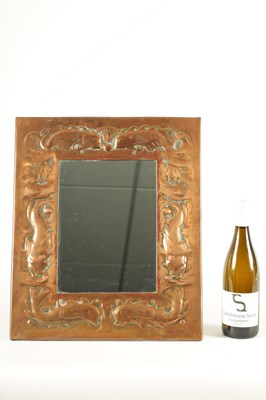 Lot 527 - AN ARTS AND CRAFTS NEWLYN SCHOOL STYLE COPPER FRAMED MIRROR