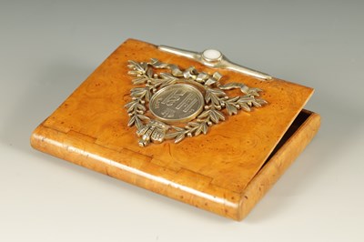 Lot 406 - AN EARLY 20TH CENTURY FABERGE SILVER MOUNTED KARELIAN BIRCH CIGARETTE CASE