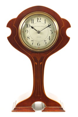 Lot 845 - AN EDWARDIAN ART NOUVEAU STYLE BOXWOOD STRUNG AND MAHOGANY INLAID MANTEL CLOCK