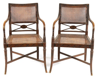 Lot 1054 - A PAIR OF REGENCY BERGERE PAINTED SIMULATED SATINWOOD OPEN ARMCHAIRS