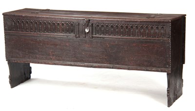 Lot 1070 - A 17TH CENTURY OAK PLANK COFFER/SWORD BOX OF LARGE SIZE