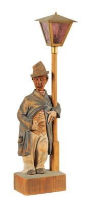 Lot 629 - A 1930’S SUNLEY MUSICAL PRODUCTS GERMAN CARVED POLYCHROME AUTOMATON FIGURE TABLE LAMP