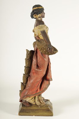 Lot 93 - A 20TH CENTURY URIELA TERRACOTTA POLYCHROME FIGURE