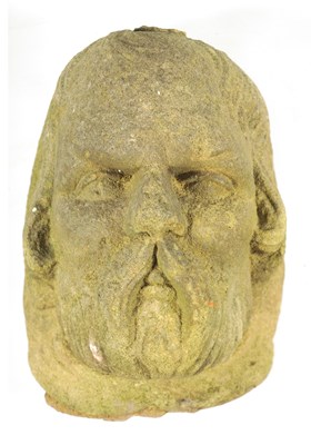 Lot 766 - AN EARLY CARVED STONE MASK HEAD