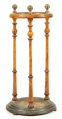 Lot 1073 - A 19TH CENTURY  CIRCULAR WALNUT UMBRELLA/STICK STAND