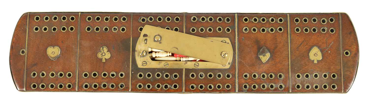 Lot 935 - A GOOD 18TH CENTURY WALNUT AND BRASS INSET CRIBBAGE BOARD