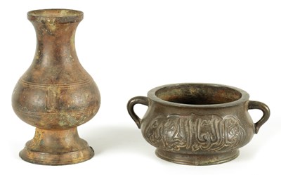 Lot 175 - A CHINESE TWO HANDLED BRONZE SHALLOW FOOTED CENSER
