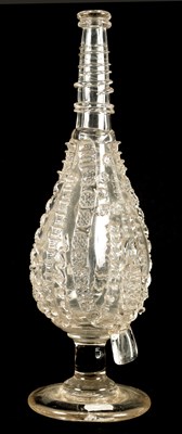 Lot 25 - AN 18TH CENTURY LARGE TAPERING CLEAR GLASS FLASK