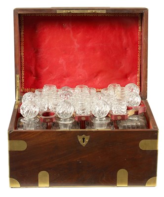 Lot 591 - A GEORGE III BRASS BOUND MAHOGANY CAMPAIGN DECANTER SET