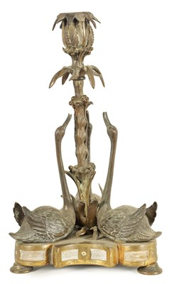 Lot 764 - A MID 19TH CENTURY PATINATED BRONZE AND ORMOLU SWAN CENTREPIECE