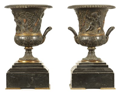 Lot 712 - A PAIR OF 19TH CENTURY FRENCH BRONZE AND ORMOLU URNS