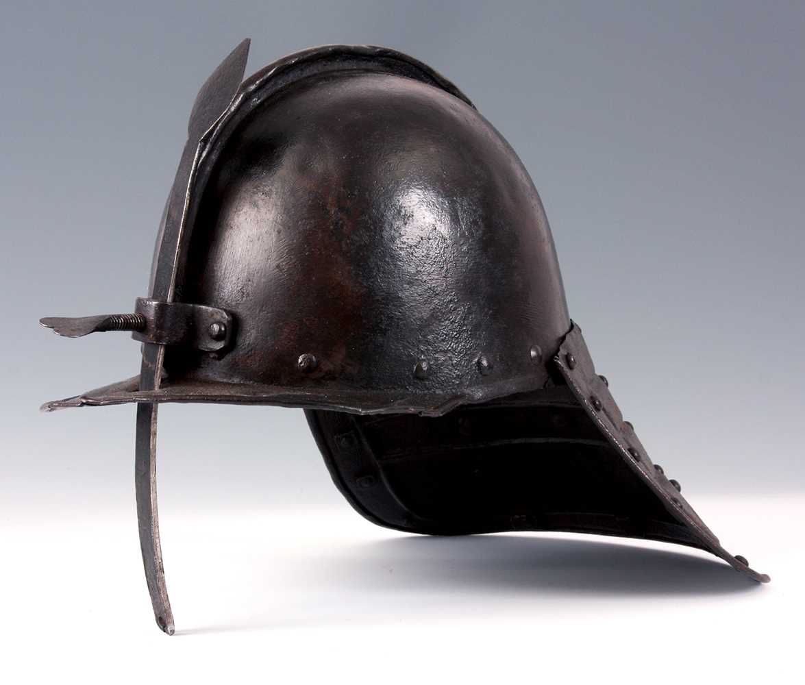 Lot 392 - A LOBSTER TAILED HELMET with single nasal bar...
