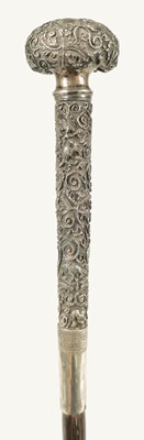 Lot 446 - A LATE 19TH CENTURY CHINESE SILVER MOUNTED RHINOCEROS HORN WALKING CANE