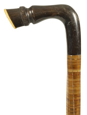 Lot 470 - A LATE 19TH CENTURY CONTINENTAL TWISTED SEGMENTED HORN HOOF HANDLE WALKING STICK