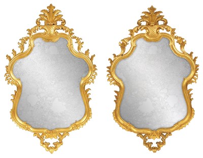 Lot 1053 - A PAIR OF 18TH/EARLY 19TH CENTURY FRENCH ROCOCO GILT GESSO HANGING MIRRORS