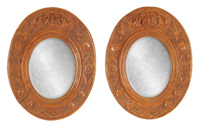 Lot 129 - A PAIR OF LATE 19TH CENTURY CHINESE CARVED BOXWOOD OVAL MIRRORS