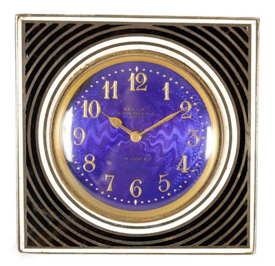 Lot 972 - A FRENCH ART DECO SILVER AND ENAMEL STRUT CLOCK