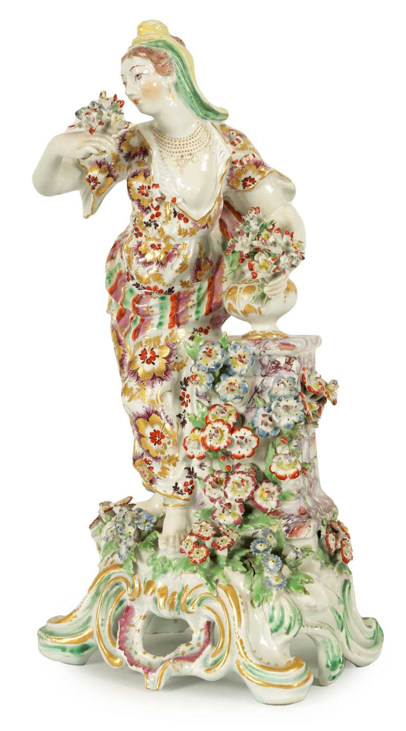 Lot 57 - AN 18TH CENTURY BOW PORCELAIN STANDING FIGURE OF FLORA