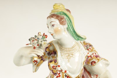 Lot 57 - AN 18TH CENTURY BOW PORCELAIN STANDING FIGURE OF FLORA
