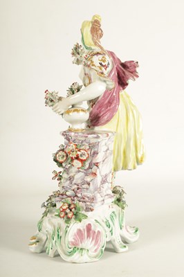 Lot 57 - AN 18TH CENTURY BOW PORCELAIN STANDING FIGURE OF FLORA