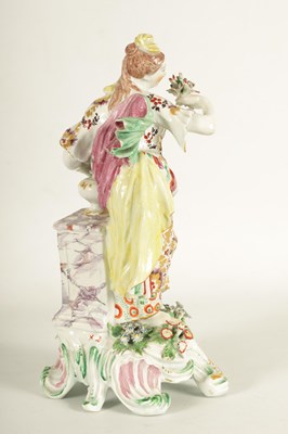 Lot 57 - AN 18TH CENTURY BOW PORCELAIN STANDING FIGURE OF FLORA
